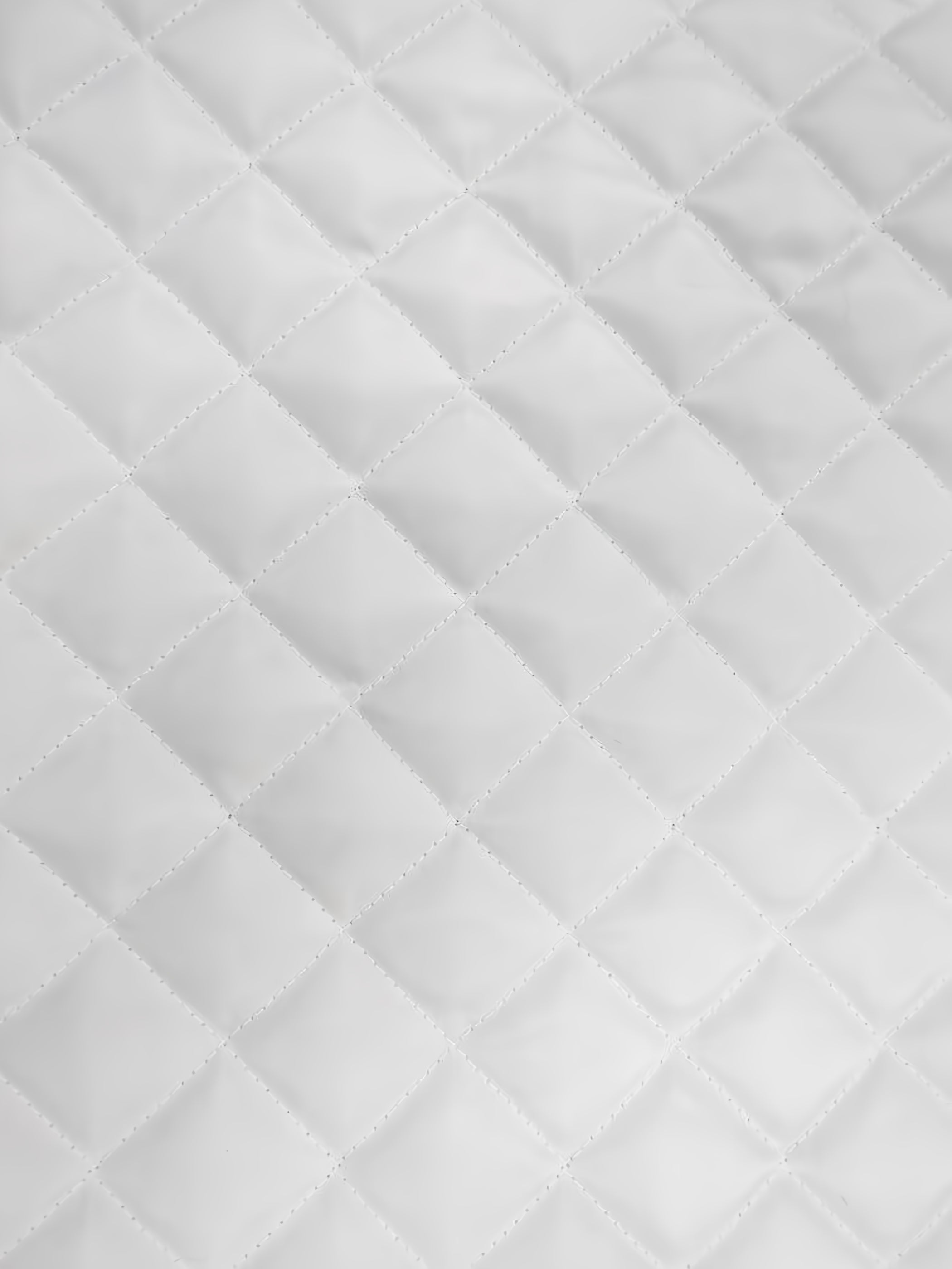 Quilted Polyester Batting Upholstery Fabric / White / Sold By The Yard