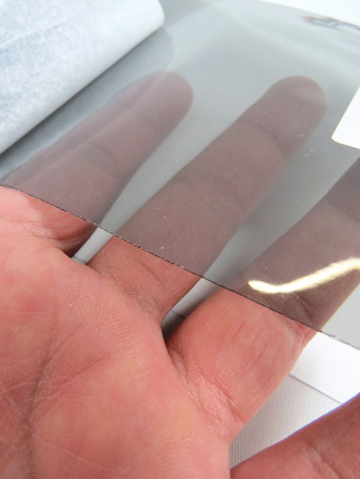 Tinted Plastic Vinyl Fabric / Grey (12 Gauge) / By The Roll - 60 Yards