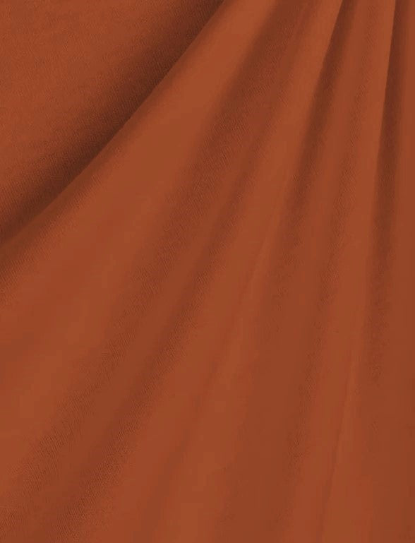 Rust Heavy Interlock Poly Cotton Fabric.