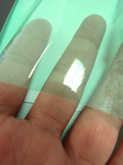 Tinted Plastic Vinyl Fabric / Multi-Color (12 Gauge) / By The Roll - 60 Yards