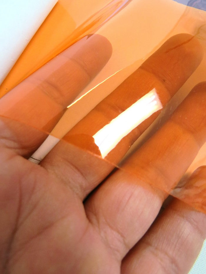 Tinted Plastic Vinyl Fabric / Peach (12 Gauge) / By The Roll - 30 Yards