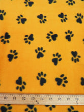 Fleece Printed Fabric Animal Paw / Yellow/Black Paws / Sold By The Yard