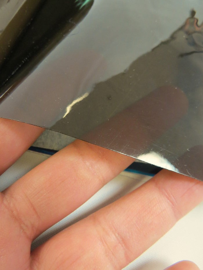 Tinted Plastic Vinyl Fabric / Smoke (12 Gauge) / By The Roll - 30 Yards