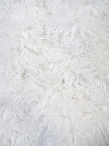 Buy white Ultra Curly Mongolian Minky Fabric
