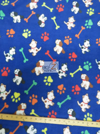Paw Print Polar Fleece Fabric / Paw & Dogs Royal / Sold By The Yard